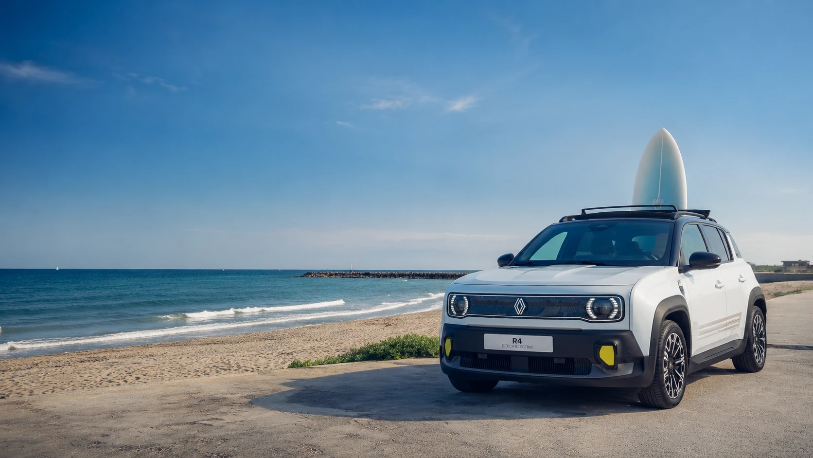Car on a coastal road at sunset during the R4 test drive, Sitges, Spain